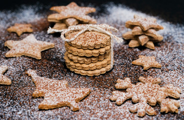 Christmas cookies with flour and cocoa topping