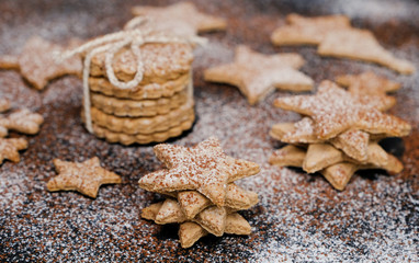 Christmas cookies with flour and cocoa topping