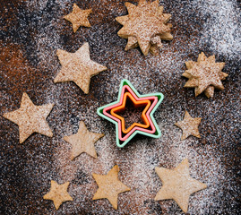 Christmas cookies with flour and cocoa topping