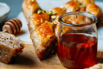  Perfect sweet baklava with pistachio on marble background