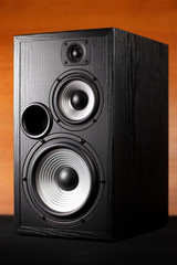 Photo of black music audio speaker. Close-up.