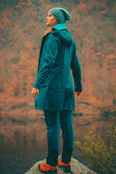 woman standing on edge