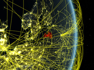 Latvia at night on planet planet Earth with network. Concept of connectivity, travel and communication.