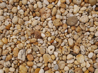 background of pebbles,brown stone,rock and sands beach,aroma stone