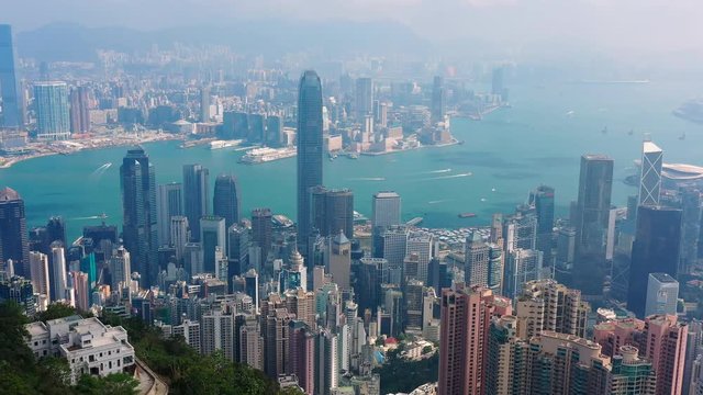 Aerial panoramic view of Hong Kong skyline, modern city with skyscrapers and famous Asian Metropolis - landscape panorama of China from above, Asia