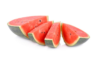 cut watermelon with seeds on white background