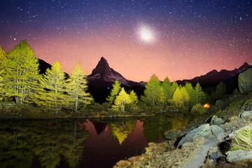Tableaux ronds sur aluminium brossé Cervin mountain lake Grindjisee on a starry night