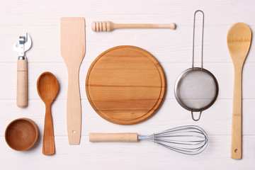 different kitchenware on a light background top view. Cooking appliances. flat lay 