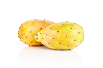 Group of two whole yellow orange fresh bright prickly pear opuntia isolated on white background