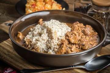 Barley groats with stewed meat.