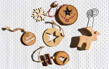 Modern wooden ornaments with Christmas message . Xmas white Background