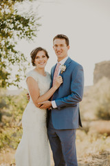 Beautiful Couple on their Wedding day in front of landscape