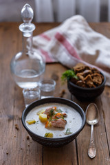Traditional Finnish Salmon and cream soup - lohikeitto, selective focus