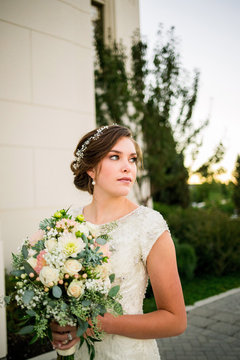 Beautiful Bride on Wedding Day with Hair Updo