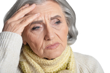 Fototapeta premium Sad senior woman isolated on white background
