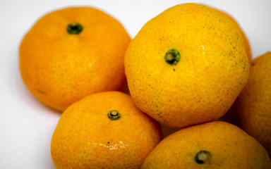 Orange is a fruit that can be eaten with anything delicious, orange on a white background, orange meat, milk, orange juice.