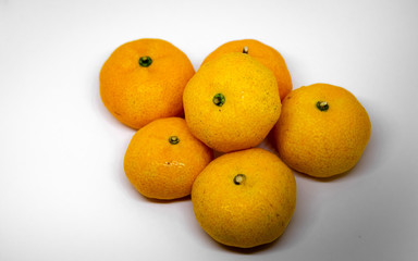 Orange is a fruit that can be eaten with anything delicious, orange on a white background, orange meat, milk, orange juice.
