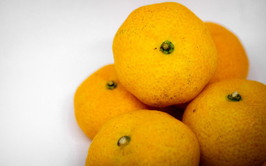 Orange is a fruit that can be eaten with anything delicious, orange on a white background, orange meat, milk, orange juice.