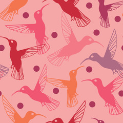 Colorful hummingbird  and dot pattern in pink, violet, red and orange. Lively spring seamless vector design with multicolor hummingbird silhouettes, perfect for textiles, invitations and fashion uses.