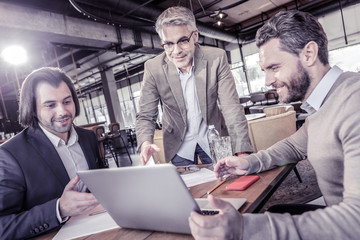 Attentive professional workers having useful online conference