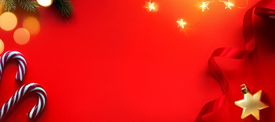 Christmas holidays composition on red background with copy space for your text