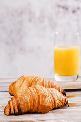 Croissant with jam and orange juice