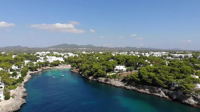 Flight over the bay of Cala D'or, village Cala D'or, Felanix and Porto Pedro region, Cala Ferrera, Mallorca