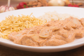Palm Heart stroganoff with rice and potato sticks. Vegal Meal