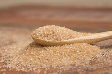 Pile of demerara sugar in a spoon