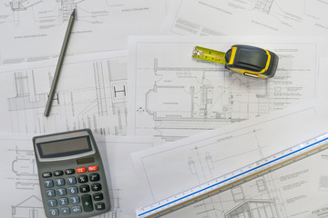 Architect concepts, Construction / building plans with equipment in the office