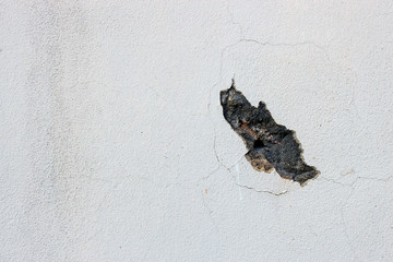 cracks on the white wall