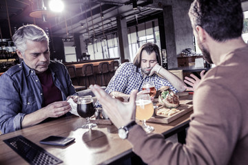Group of males colleagues that having rest