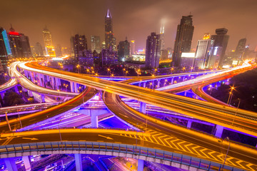 Obraz premium Traffic tracks in the downtown area of Shanghai at night