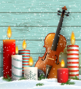Christmas theme with violin and burning candles