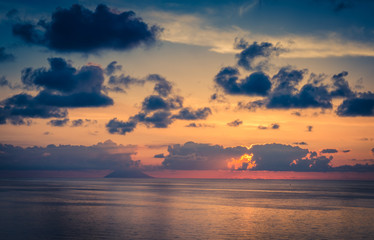 Fototapeta premium Aerial view of beautiful amazing sea sunset with color dramatic sky