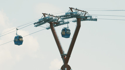 Fototapeta premium Cable car to Vinpearl amusement park in the morning sunshine to attract tourists to the weekend relaxing in Nha Trang, Vietnam