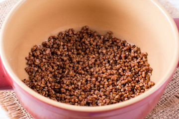 Buckwheat grain in the saucepan