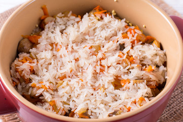 Porridge with vegetables in a saucepan