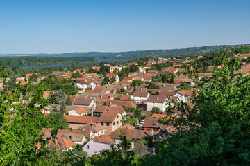 Fototapeta na wymiar Sremski Karlovci, Serbia - May 2, 2018: Panorama of Sremski Karlovci. Panoramic view of the roofs of the house, Chappel of Peace and Danube river.