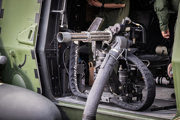 Fototapeta na wymiar Military helicopter door gunner machine gun