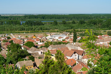 Sremski Karlovci, Serbia - May 2, 2018: Panorama of Sremski Karlovci. Panoramic view of the roofs of the house and Danube river.