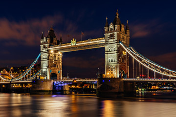 Night view of the Tower Bridge and Thames in London, England