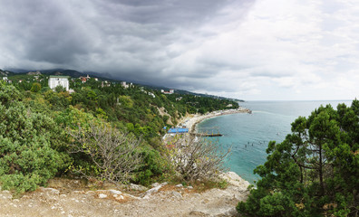 Rain cloud finds from the mountains to Simeiz village in Crimea