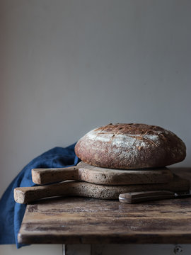 Oil and wholegrain bread on table