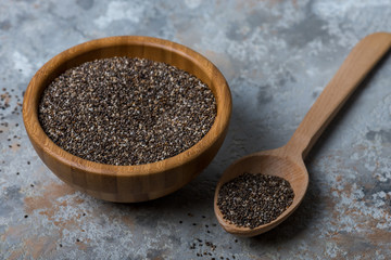 chia seeds on grey  background, sellective focus. Superfood