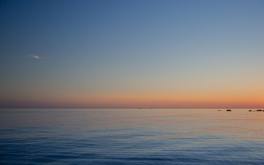 Calm sea in blue and purple colors 