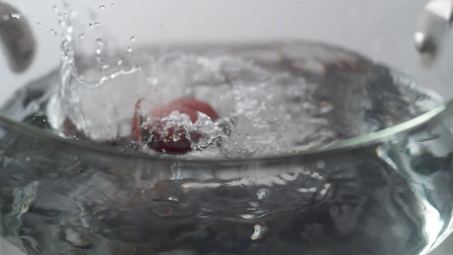 Camera follows cooking insalatonde pasta in boiling water. Shot with high speed camera, phantom flex 4K. Slow Motion.
