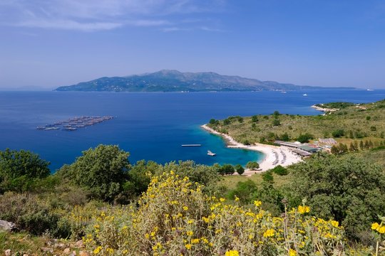 Coast with beach Gjiri i Hartes, behind the Greek island of Corfu, National Park Butrint, between Ksamil and Saranda, Sarande, Ionian Sea, Qark Vlora, Albania, Europe