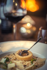 risotto with Spike bone and cheese on top, seasonal winter food, modern gastronomy