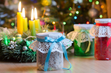 Gifts on the background of decorated spruce.